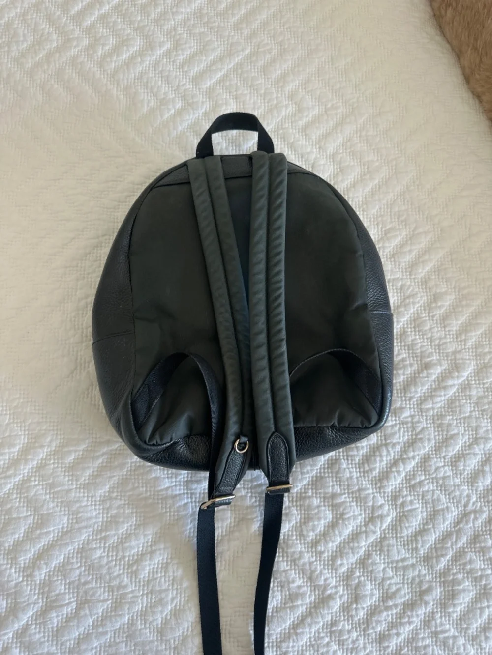Black leather Coach backpack